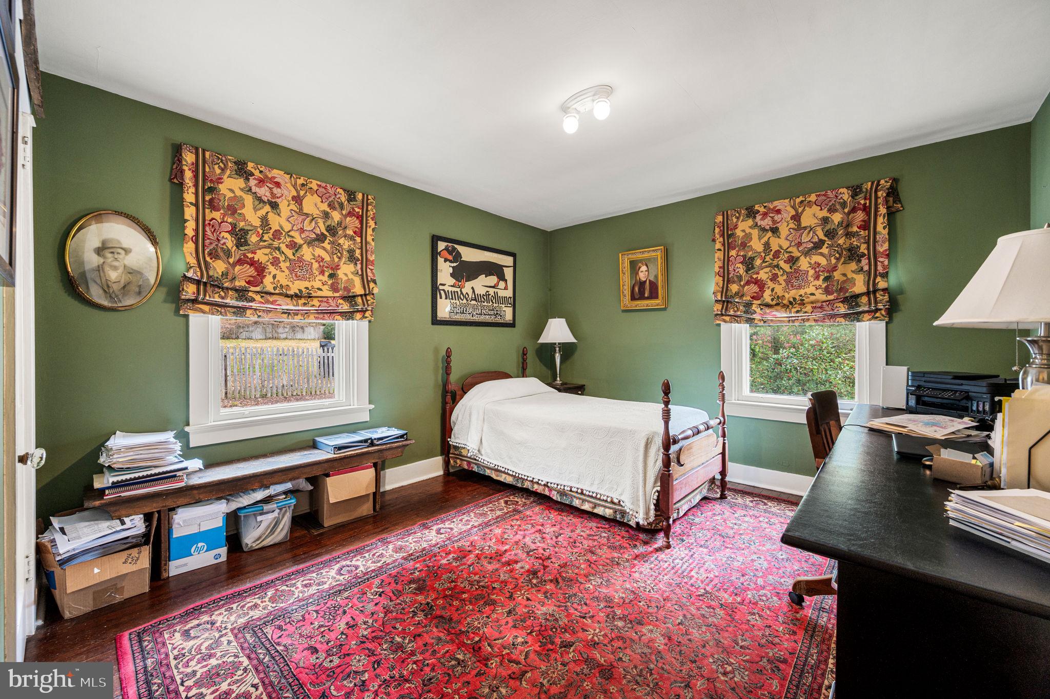 1033 Lenape Road West Chester, PA 19382 - Photo 14 of 33 a bedroom with furniture and a window