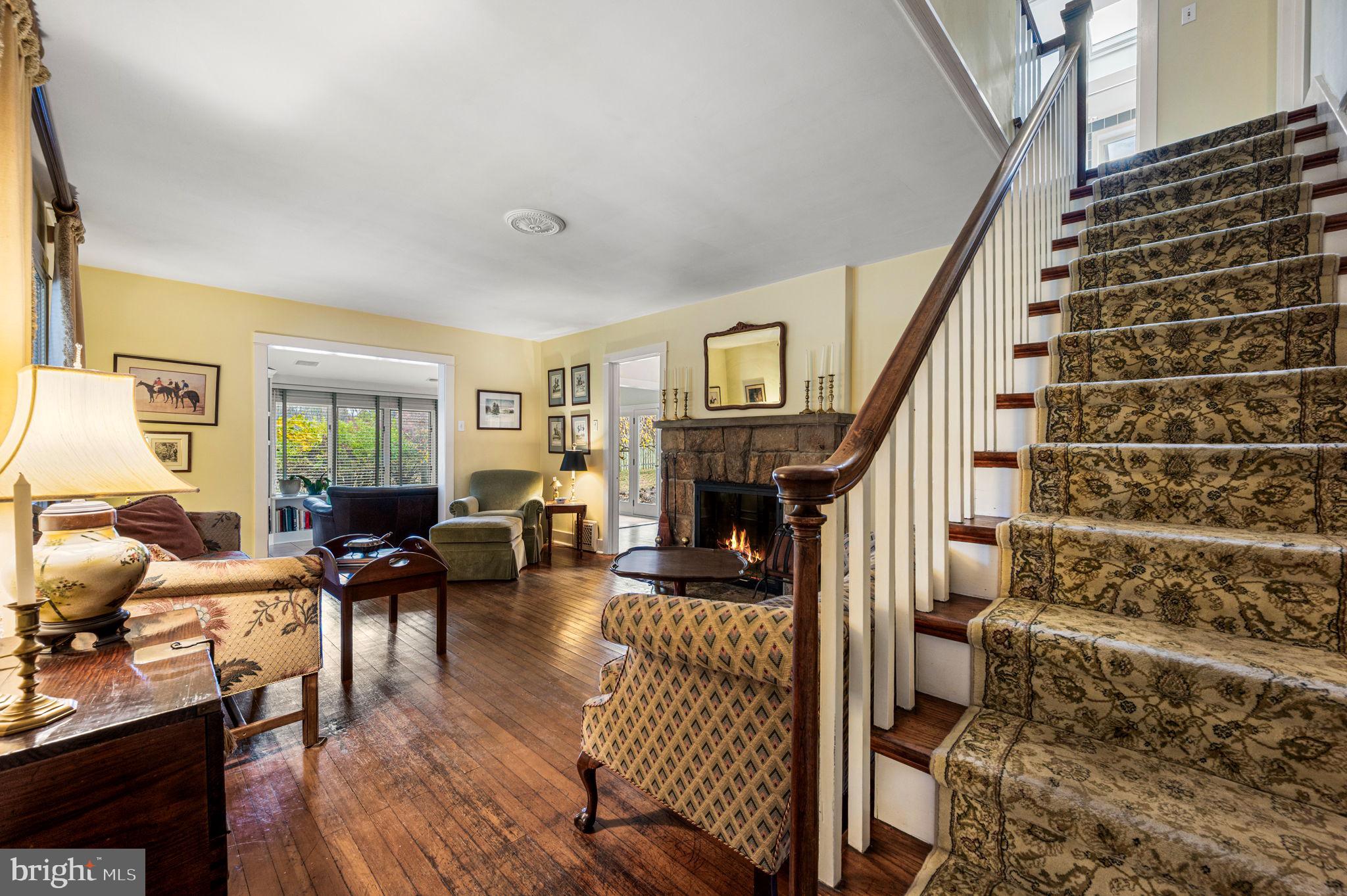 1033 Lenape Road West Chester, PA 19382 - Photo 2 of 33 a living room with furniture and a fireplace