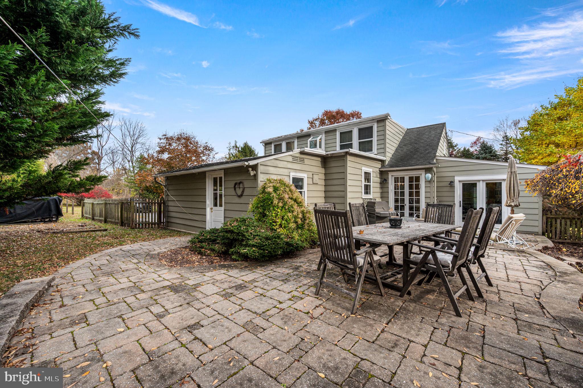 1033 Lenape Road West Chester, PA 19382 - Photo 23 of 33 a view of a house with backyard and sitting area