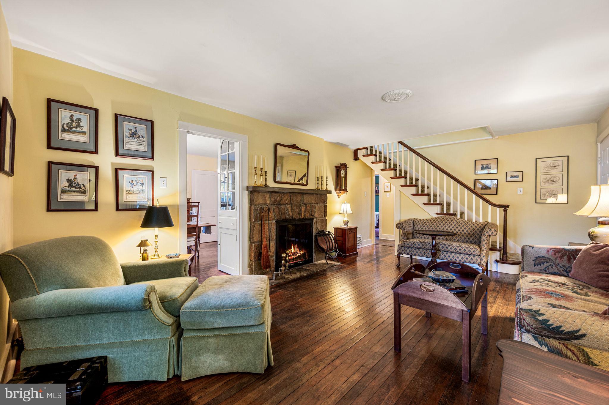 1033 Lenape Road West Chester, PA 19382 - Photo 5 of 33 a living room with fireplace furniture and a fireplace