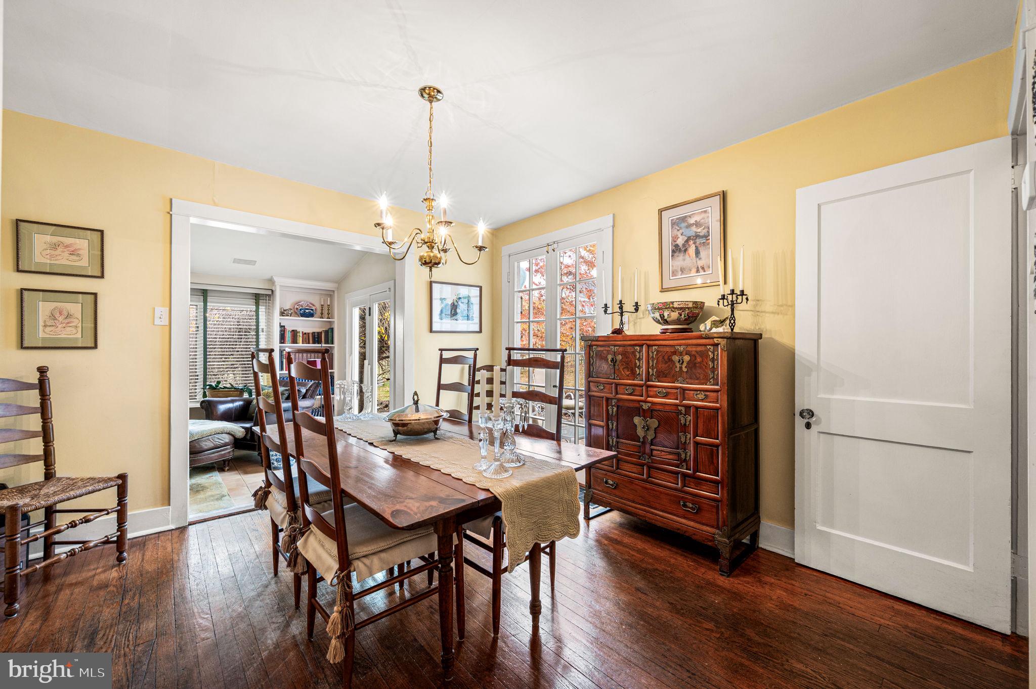 1033 Lenape Road West Chester, PA 19382 - Photo 6 of 33 a view of a dining room with furniture window and wooden floor