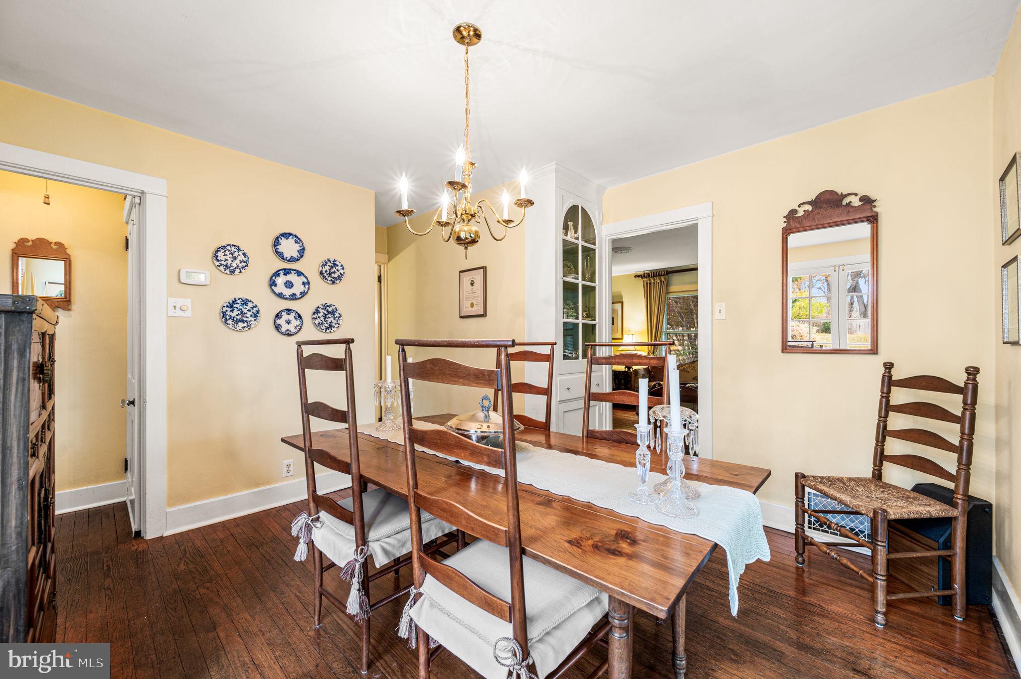 1033 Lenape Road West Chester, PA 19382 - Photo 7 of 33 a living room with furniture and wooden floor