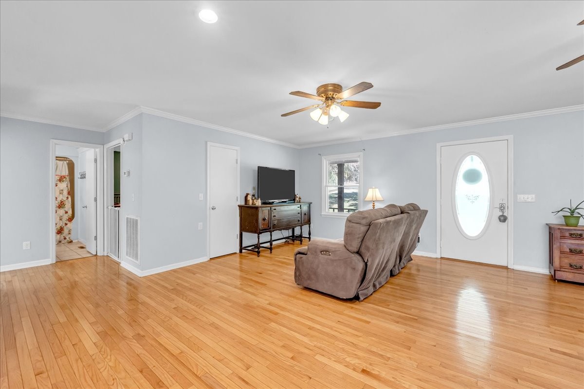487 County Line Road Lynchburg, TN 37352 - Photo 21 of 63 a living room with furniture and a flat screen tv