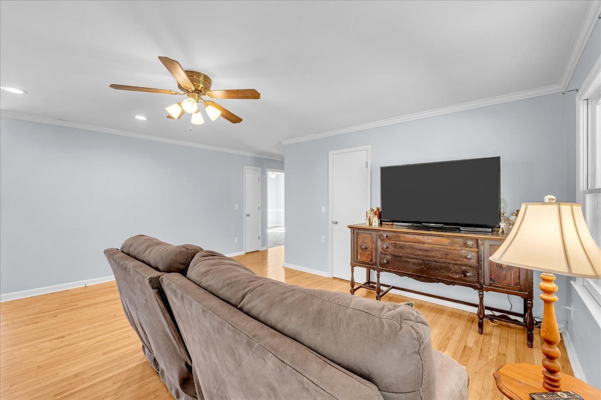 487 County Line Road Lynchburg, TN 37352 - Photo 22 of 63 a living room with furniture and a flat screen tv