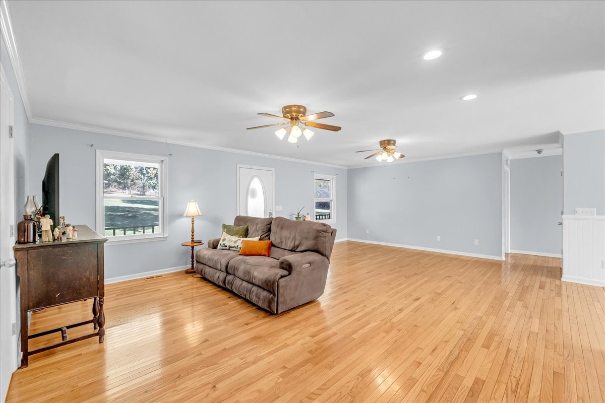 487 County Line Road Lynchburg, TN 37352 - Photo 23 of 63 a living room with furniture and a flat screen tv