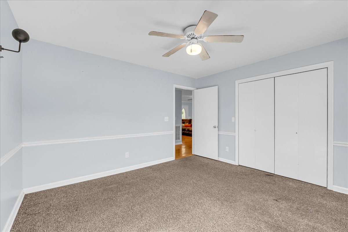 487 County Line Road Lynchburg, TN 37352 - Photo 25 of 63 a view of an empty room with a ceiling fan