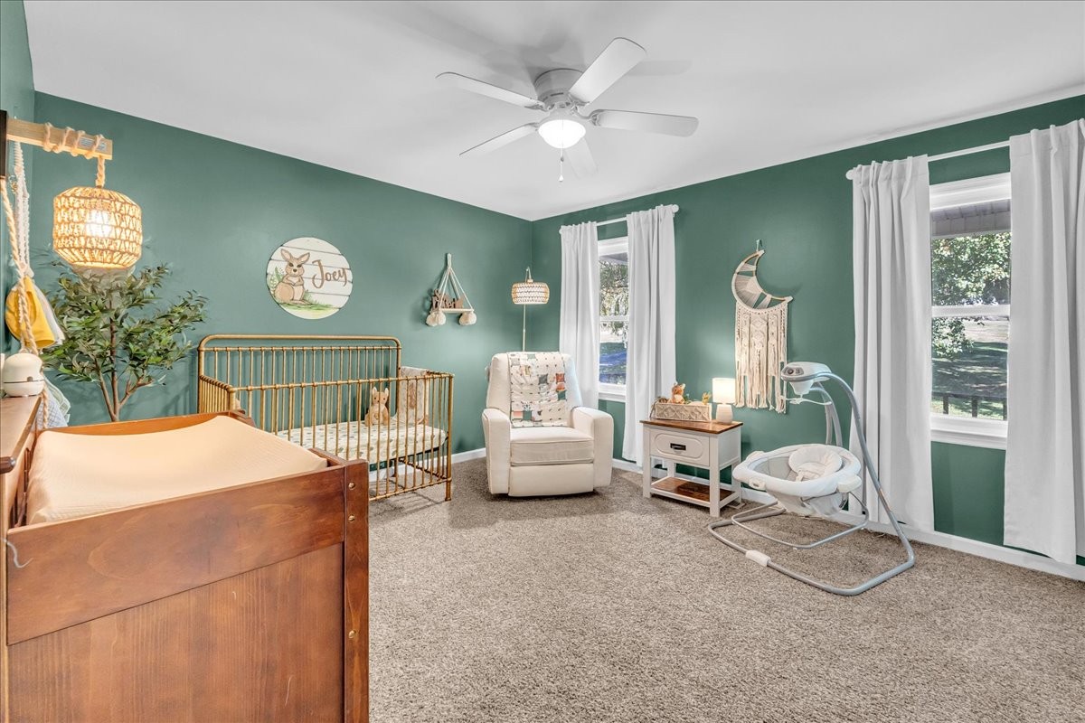 487 County Line Road Lynchburg, TN 37352 - Photo 27 of 63 a living room with furniture and a large window