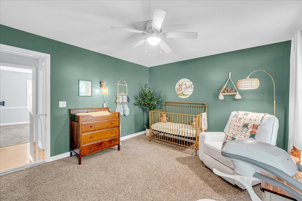 487 County Line Road Lynchburg, TN 37352 - Photo 28 of 63 a living room with furniture and a wall painting