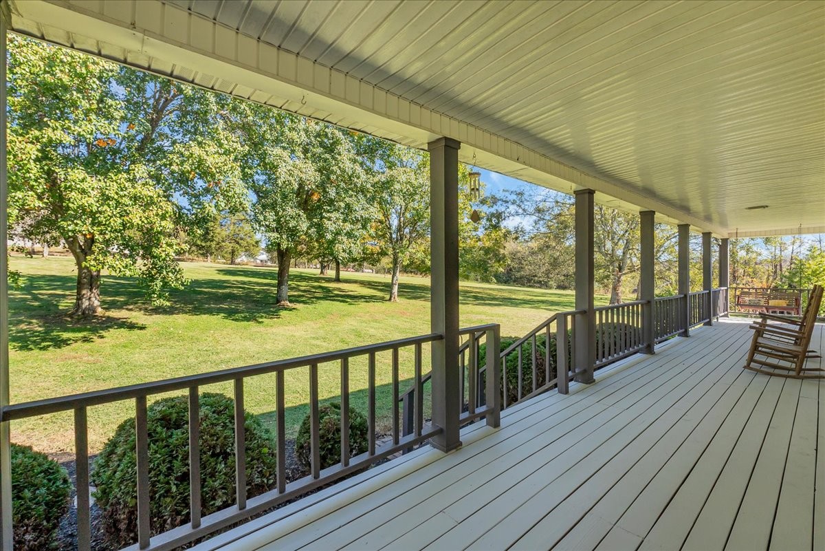 487 County Line Road Lynchburg, TN 37352 - Photo 41 of 63 a view of a balcony with wooden floor