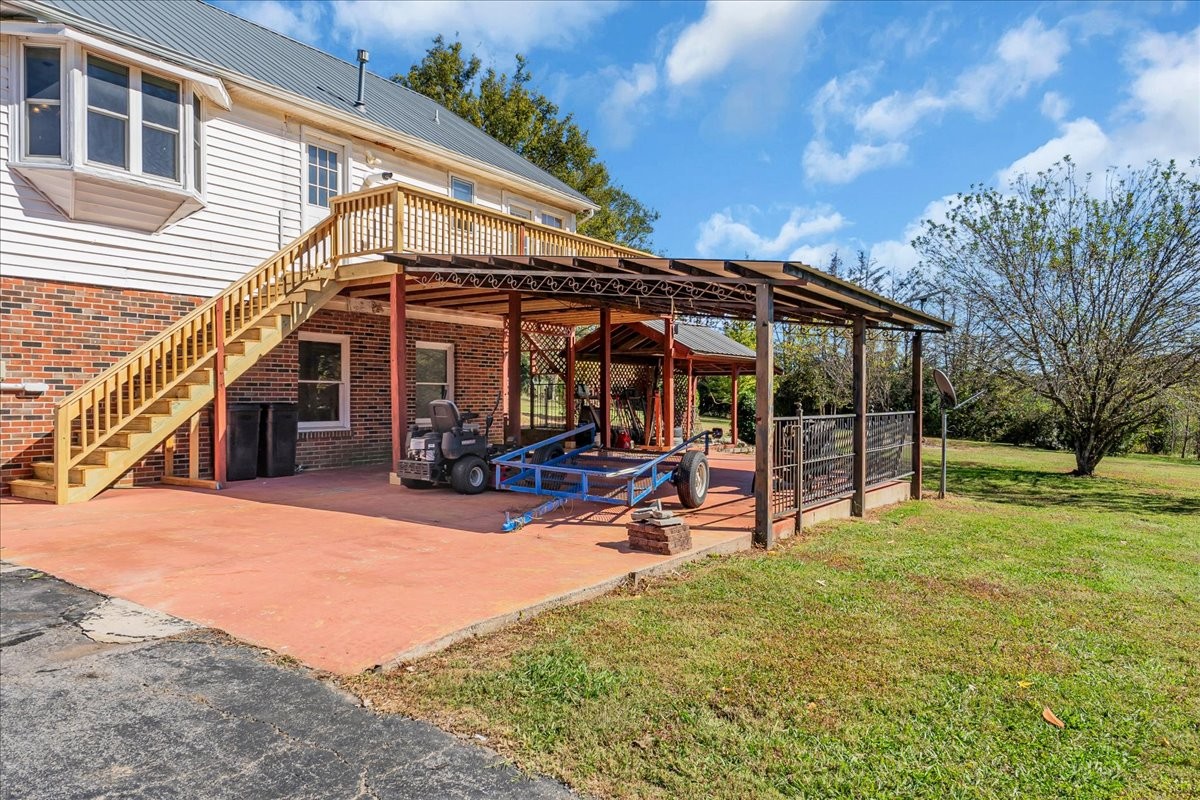487 County Line Road Lynchburg, TN 37352 - Photo 47 of 63 a view of a house with backyard porch and sitting area