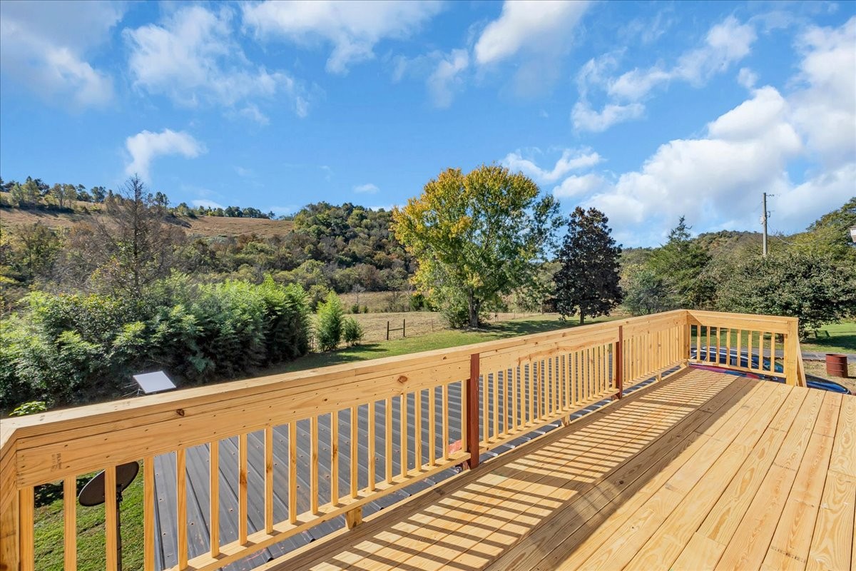 487 County Line Road Lynchburg, TN 37352 - Photo 48 of 63 a view of balcony with wooden floor and fence
