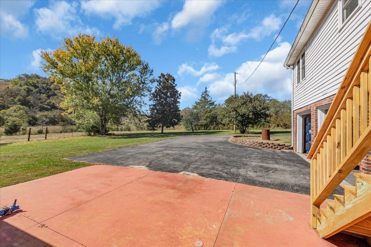 487 County Line Road Lynchburg, TN 37352 - Photo 49 of 63 a view of a yard with a house