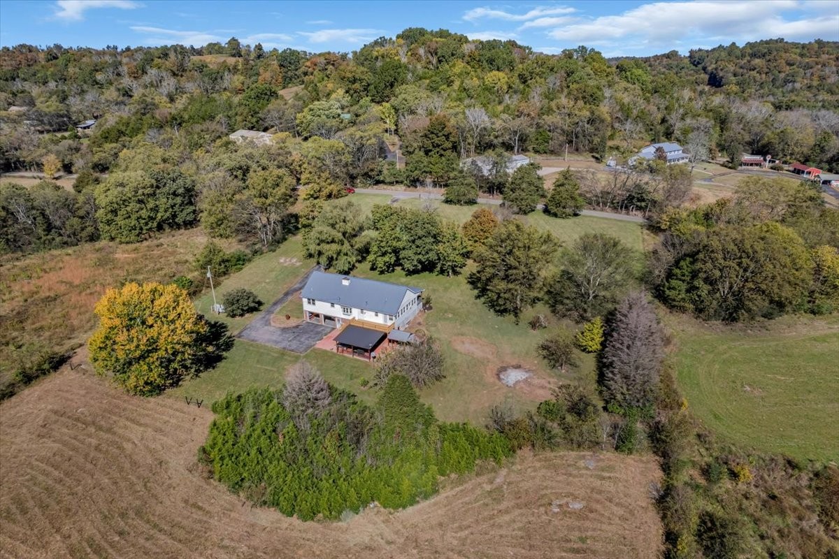 487 County Line Road Lynchburg, TN 37352 - Photo 58 of 63 an aerial view of a house with a yard