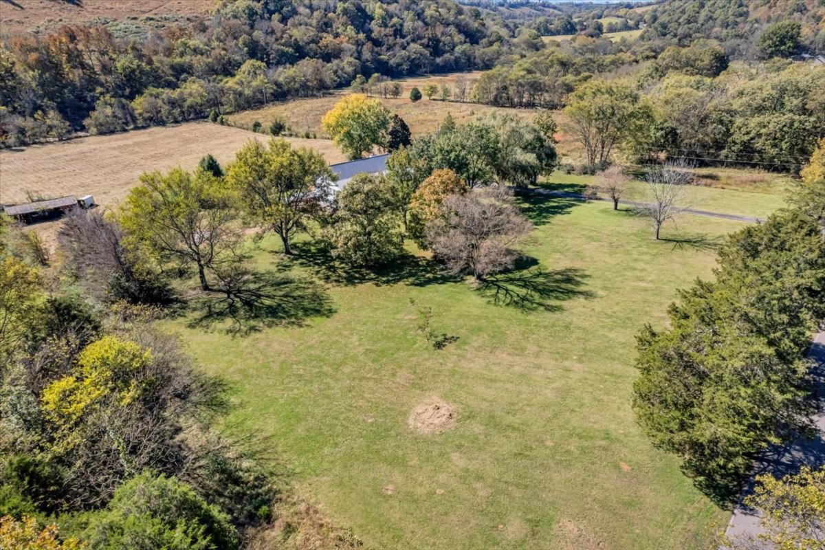 487 County Line Road Lynchburg, TN 37352 - Photo 60 of 63 a view of a lake with large trees