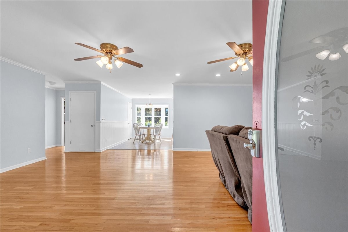 487 County Line Road Lynchburg, TN 37352 - Photo 7 of 63 wooden floor in an empty room with a window
