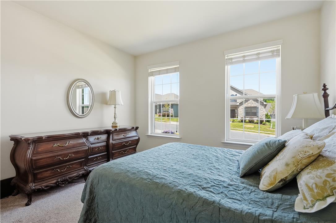 4120 Eveningstar Road Emmaus, PA 18049 - Photo 32 of 62 Well-lit sleeping quarters with neighborhood views and plush carpet flooring.