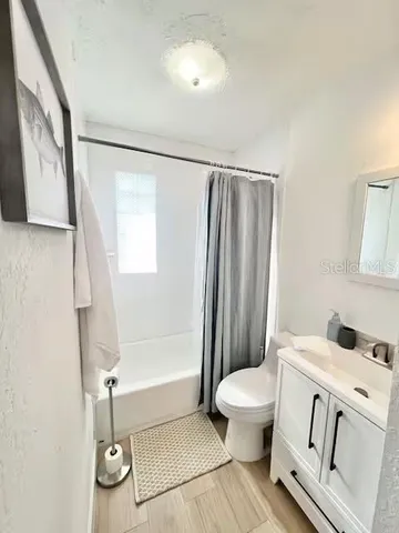 a stove top oven sitting inside of a kitchen