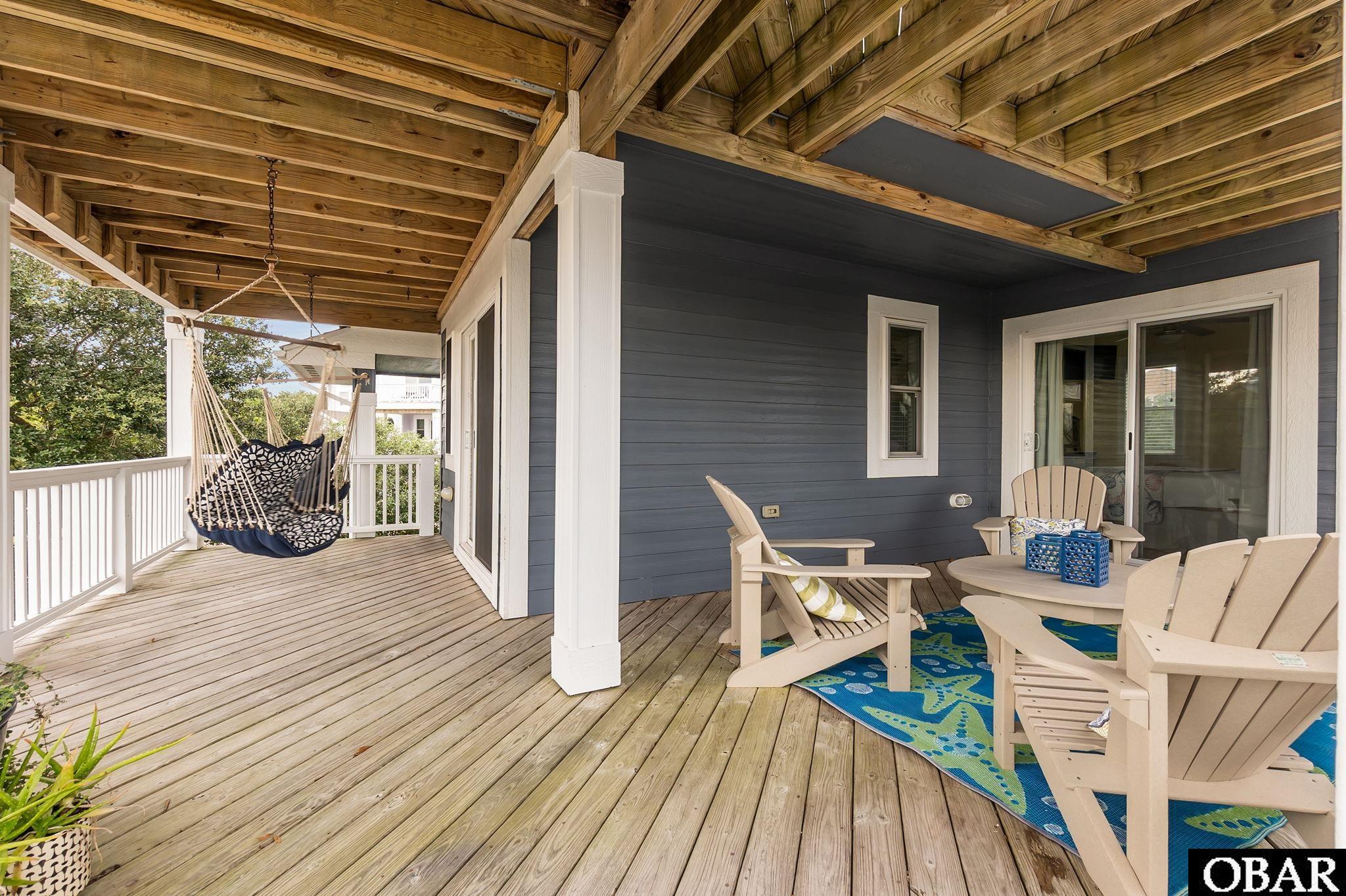 313 Apollo Court Kitty Hawk, NC 27949 - Photo 34 of 49 Expansive Mid-Level Shaded Porch