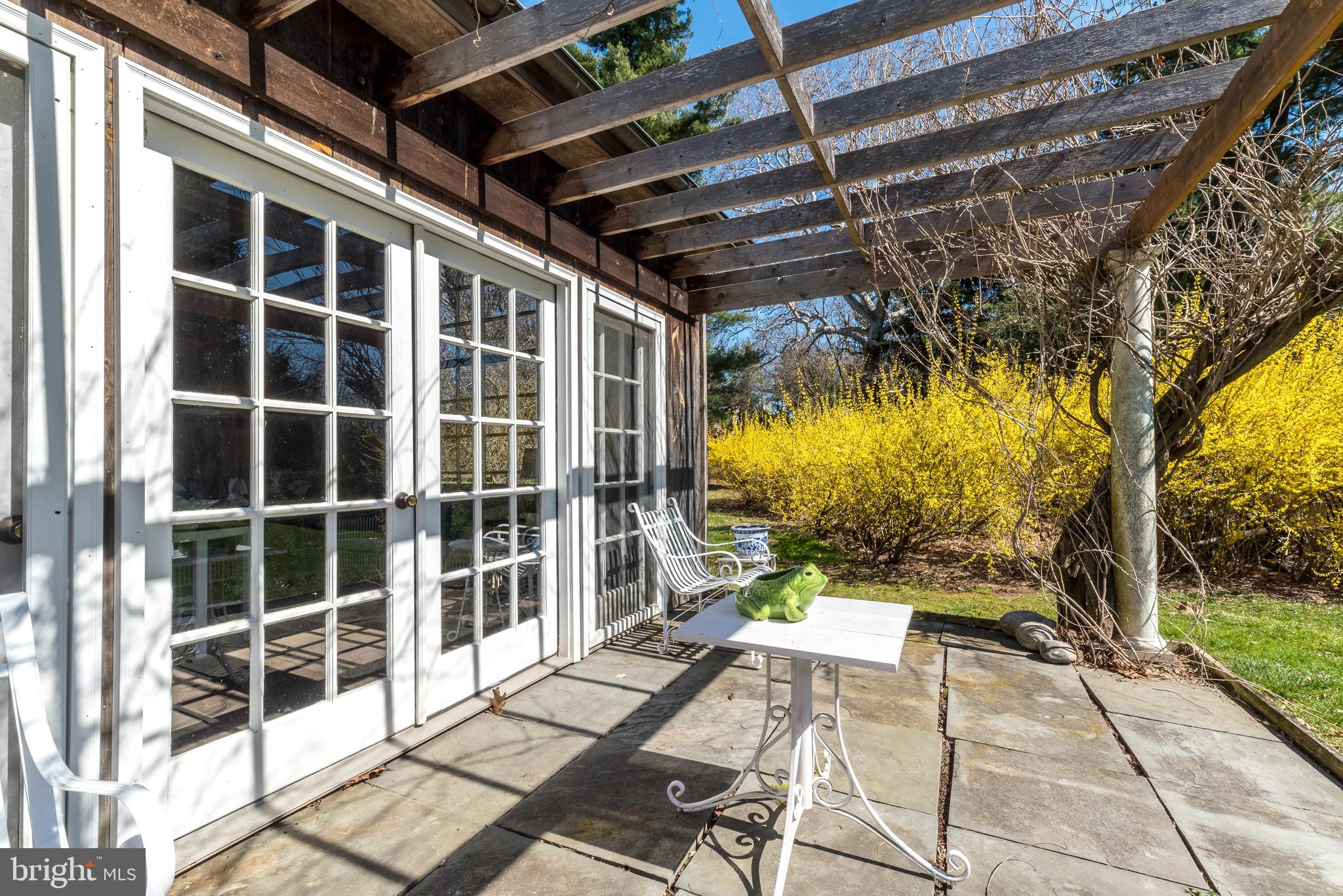 4522 New Hope Road New Hope, PA 18938 - Photo 64 of 101 Wisteria climbing along the trellis above patio
