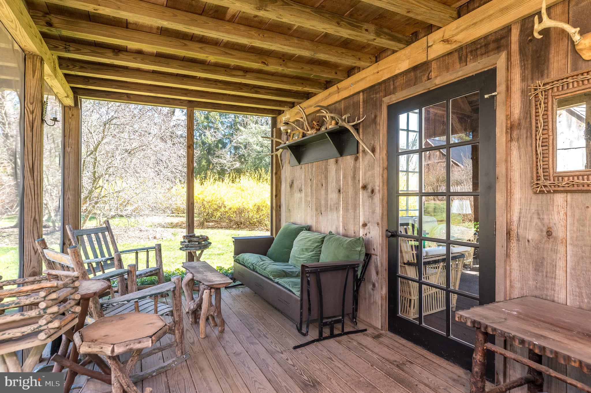 4522 New Hope Road New Hope, PA 18938 - Photo 68 of 101 Screened porch on other side.