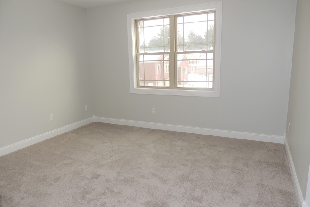 Lot 77 Alwin Place Springfield, MA 01128 - Photo 13 of 30 an empty room with a window