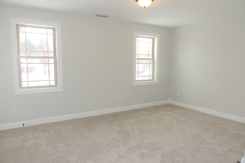 Lot 77 Alwin Place Springfield, MA 01128 - Photo 15 of 30 an empty room with a window