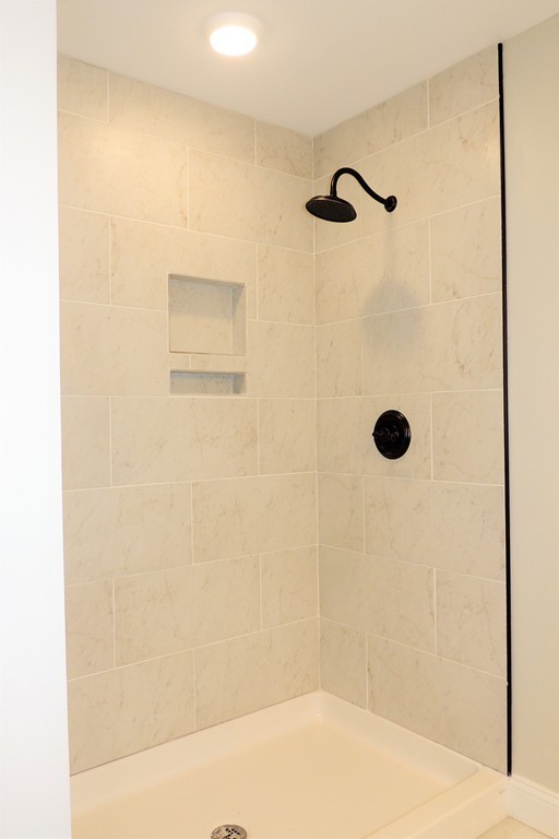 Lot 77 Alwin Place Springfield, MA 01128 - Photo 24 of 30 a bathroom with a shower
