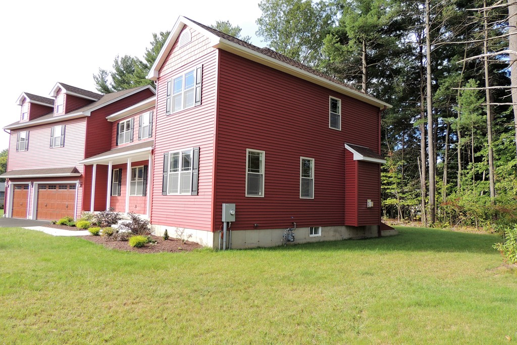 Lot 77 Alwin Place Springfield, MA 01128 - Photo 27 of 30 a front view of a house with garden