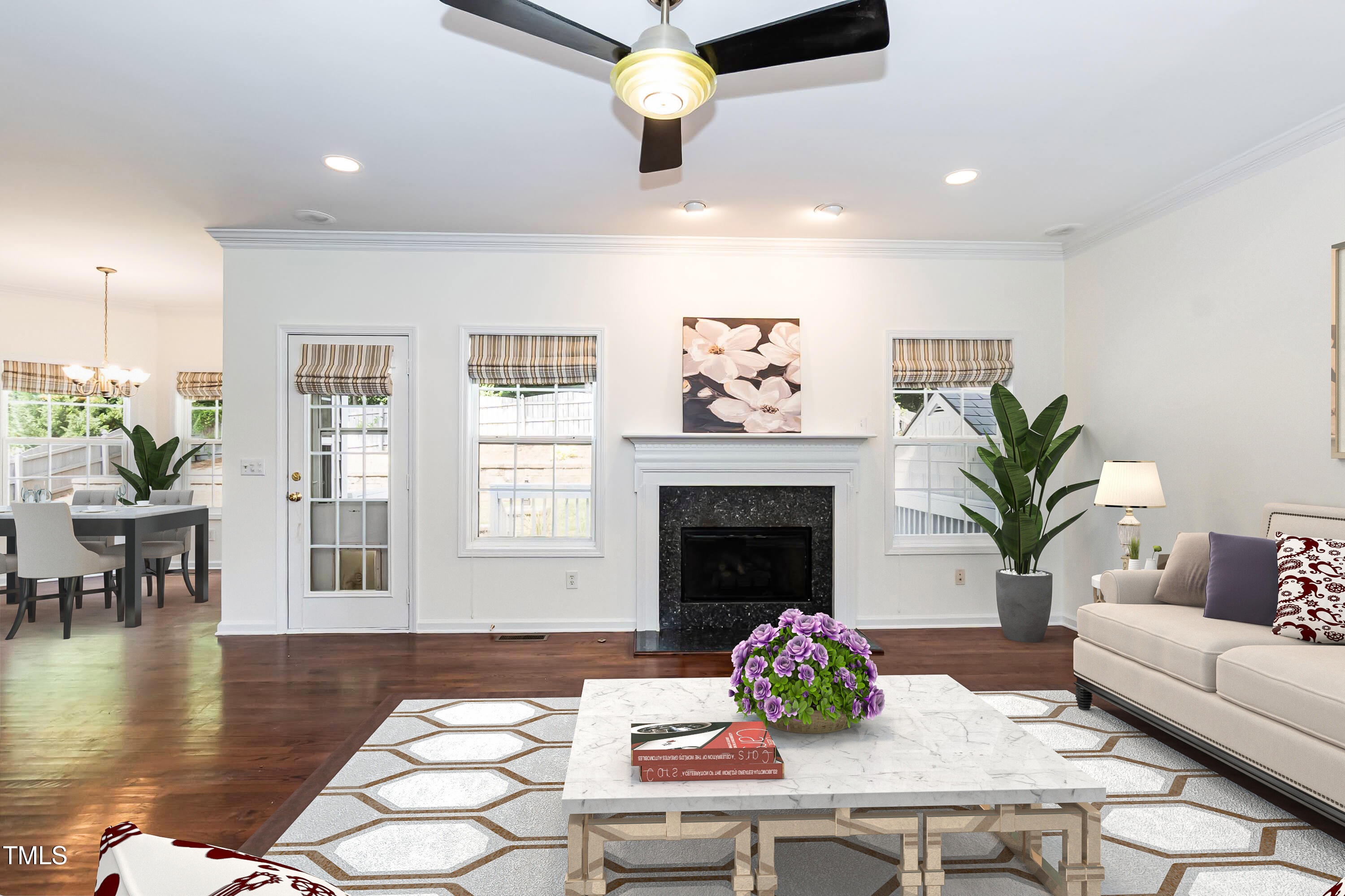 212 Mickleson Ridge Drive Raleigh, NC 27603 - Photo 5 of 58 a living room with furniture fireplace and dining room