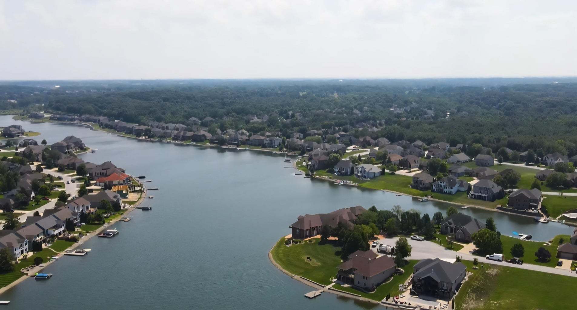 9275 Doubletree Drive South Winfield, IN 46307 - Photo 3 of 30 an aerial view of lake and residential houses with outdoor space