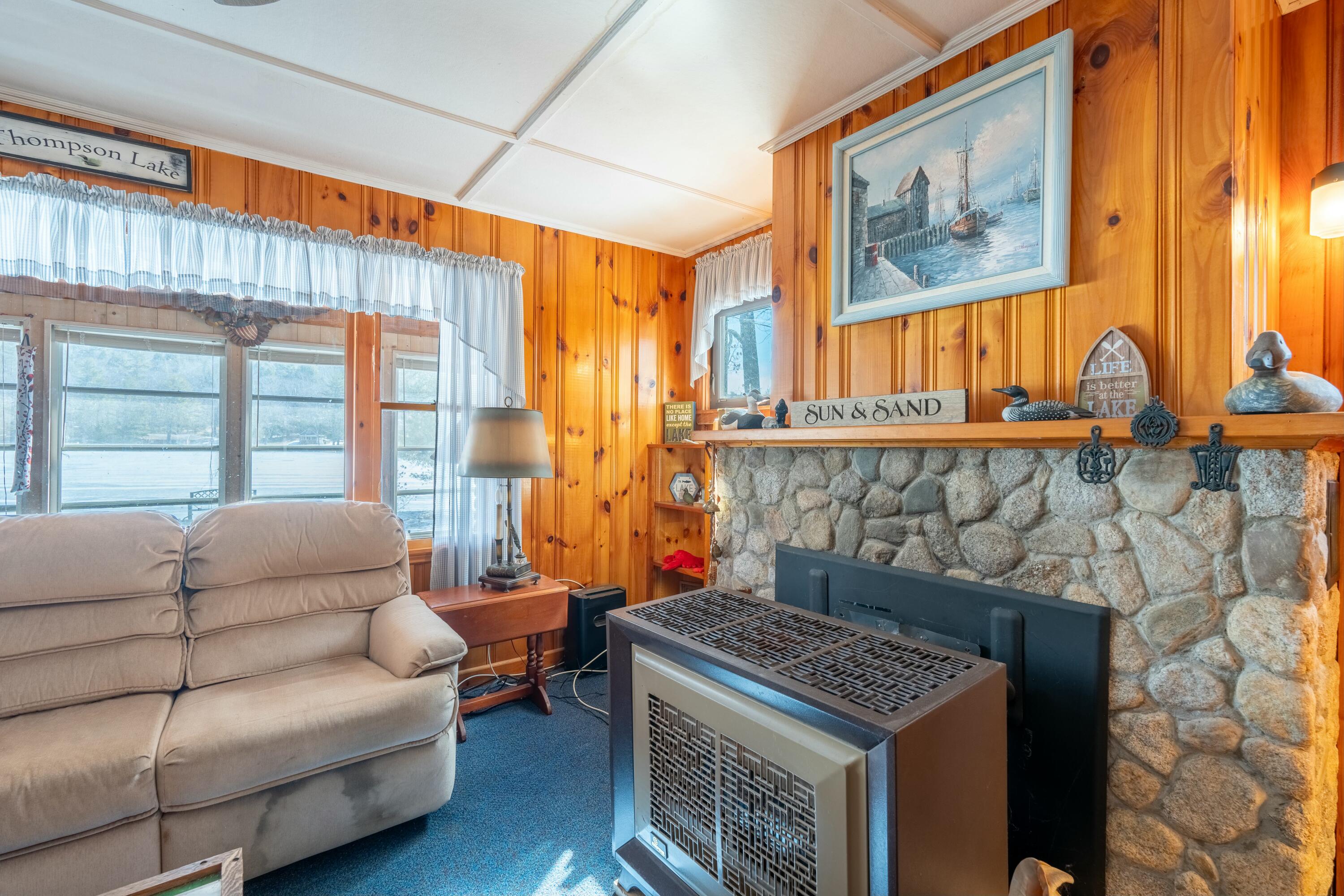 25 Parsons Point Road Casco, ME 04015 - Photo 23 of 58 Stone Fireplace