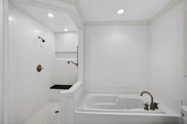 a view of a livingroom with workspace and a window