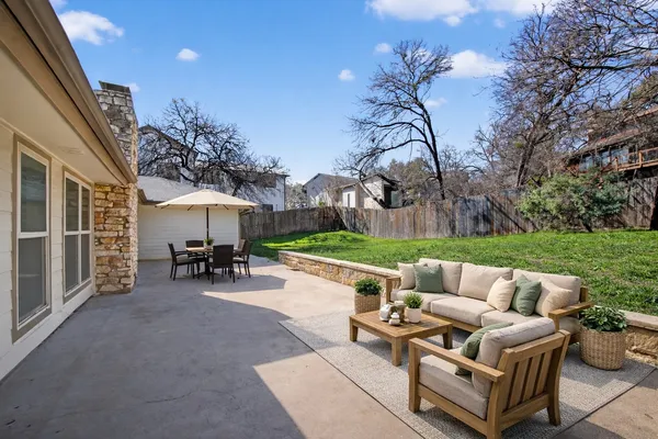 a view of a house with a yard and garage