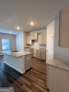 107 Brexley Drive Calhoun, GA 30701 - Photo 12 of 28 a kitchen with a sink window and cabinets