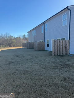 107 Brexley Drive Calhoun, GA 30701 - Photo 5 of 28 a view of a backyard of the house