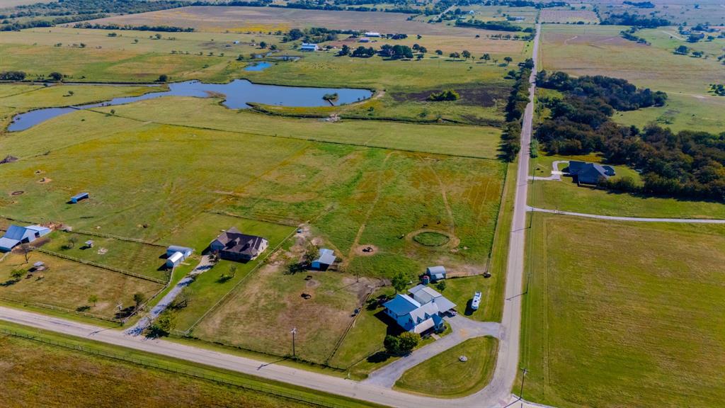 12509 Strittmatter Road Pilot Point, TX 76258 - Photo 12 of 24 an aerial view of residential house with outdoor space