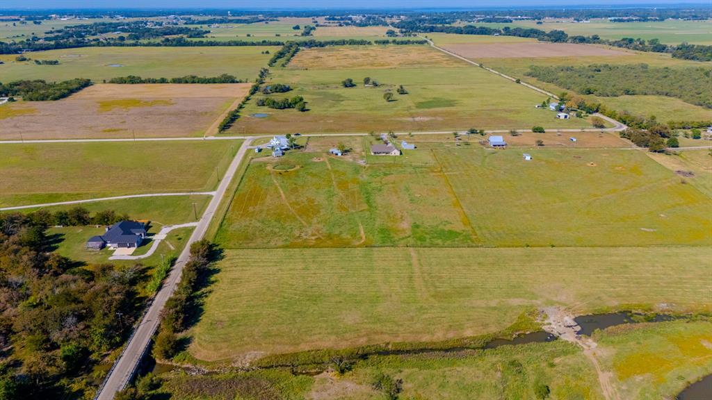 12509 Strittmatter Road Pilot Point, TX 76258 - Photo 15 of 24 a view of an ocean from a balcony