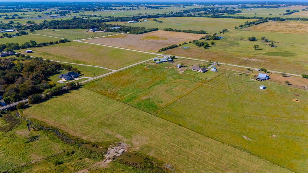 12509 Strittmatter Road Pilot Point, TX 76258 - Photo 18 of 24 a view of a tennis court