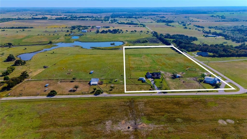 12509 Strittmatter Road Pilot Point, TX 76258 - Photo 2 of 24 an aerial view of a residential houses with outdoor space