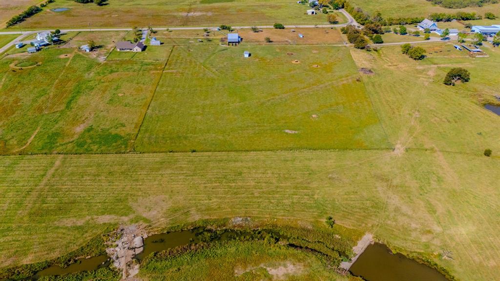 12509 Strittmatter Road Pilot Point, TX 76258 - Photo 21 of 24 a view of beach and shower