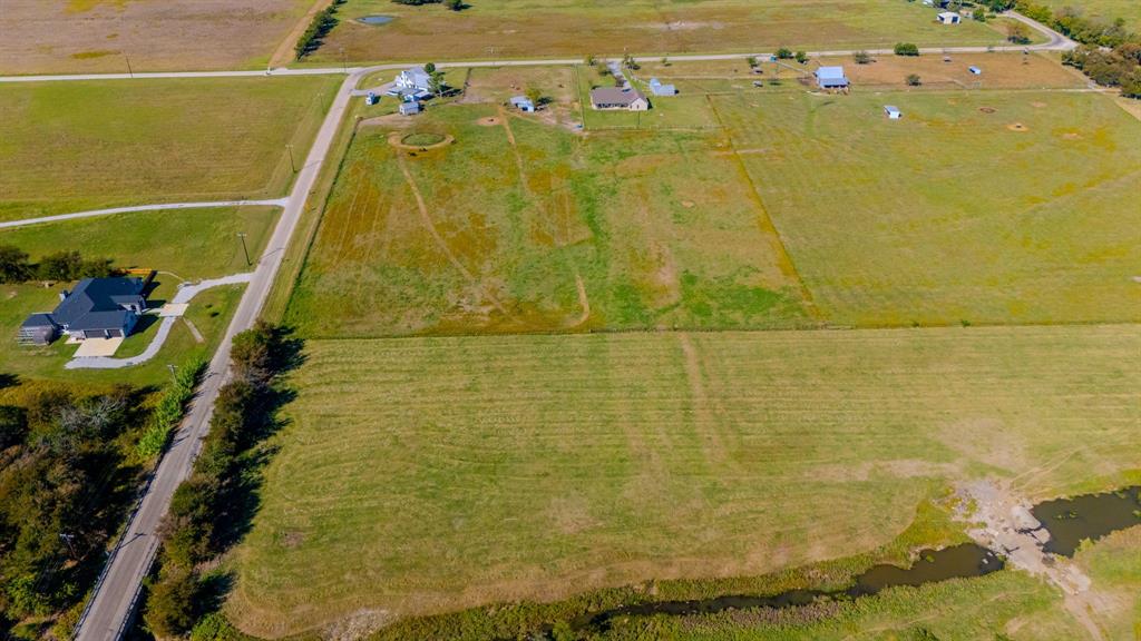 12509 Strittmatter Road Pilot Point, TX 76258 - Photo 22 of 24 a bathroom with a shower