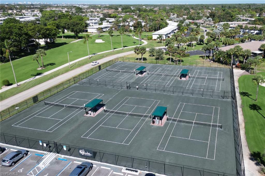 186 Harrison Road, Unit H4 Naples, FL 34112 - Photo 20 of 34 Championship level tennis on six Har-Tru clay courts