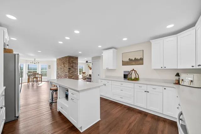 an aerial view of a house with outdoor space swimming pool