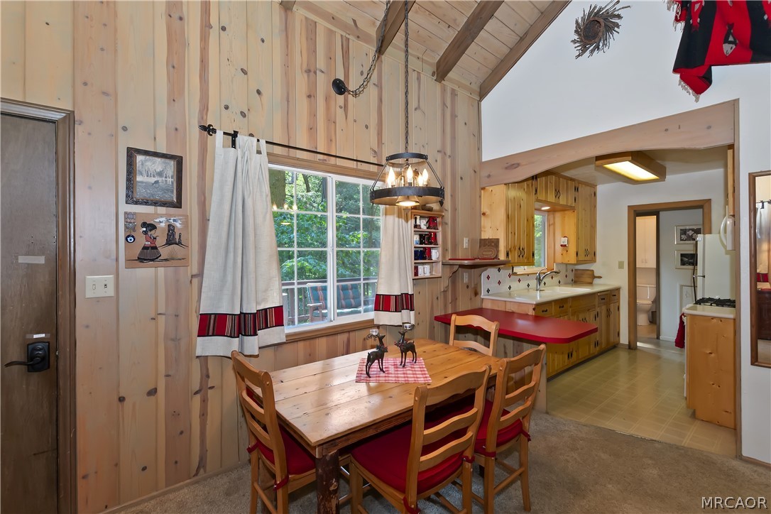 691 Cottage Grove Road Lake Arrowhead, CA 92352 - Photo 12 of 28 a dining room with furniture and window