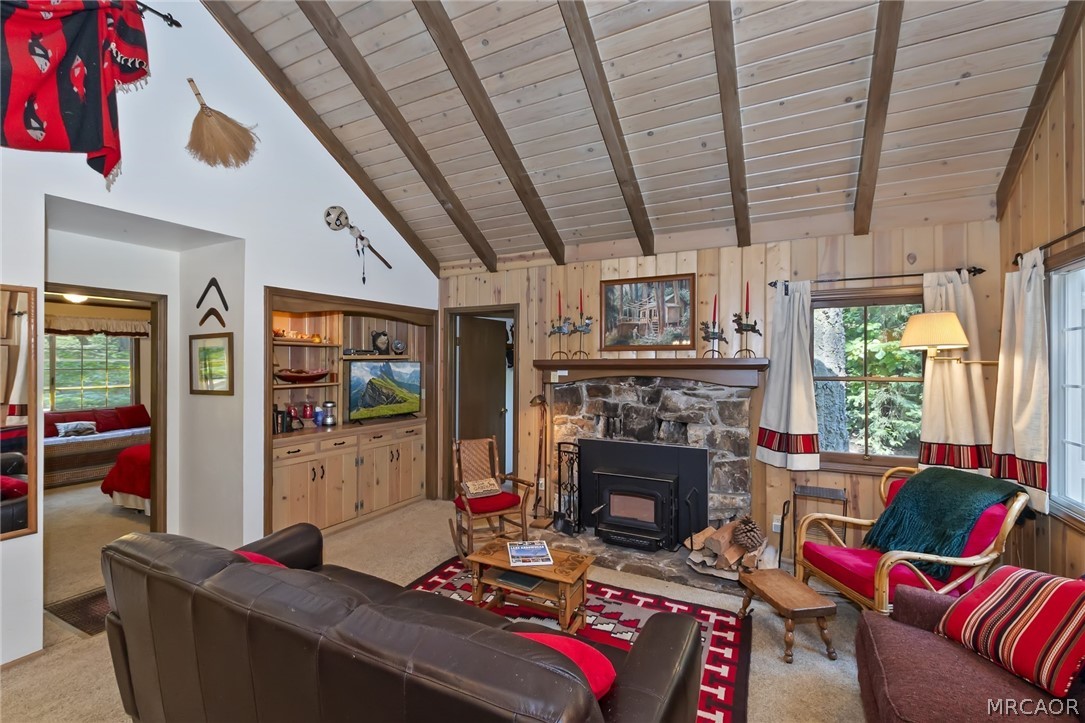 691 Cottage Grove Road Lake Arrowhead, CA 92352 - Photo 9 of 28 a living room with furniture and a fireplace