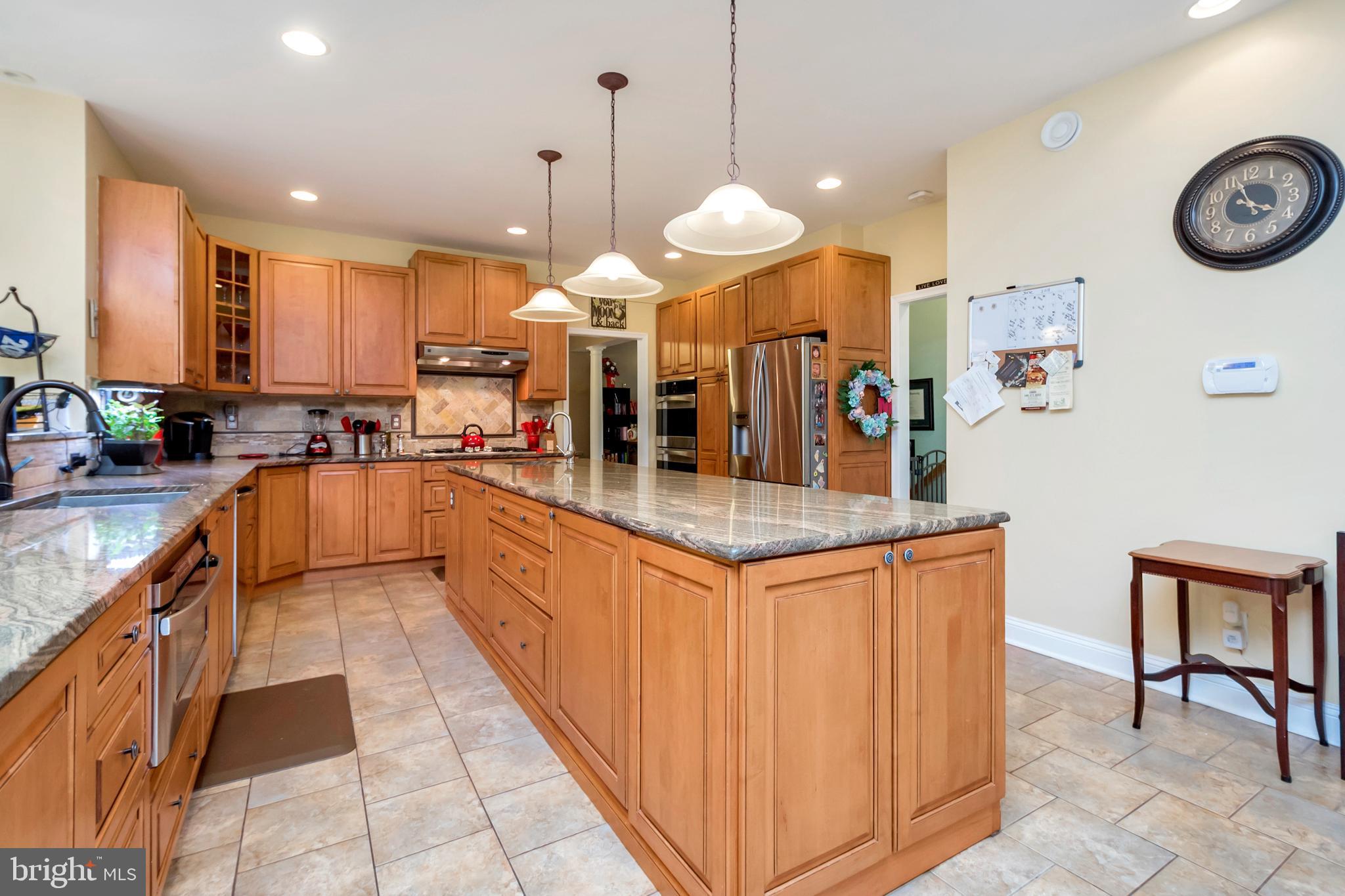 45 Crowncrest Road Fredericksburg, VA 22406 - Photo 12 of 17 a large kitchen with lots of counter space and stainless steel appliances