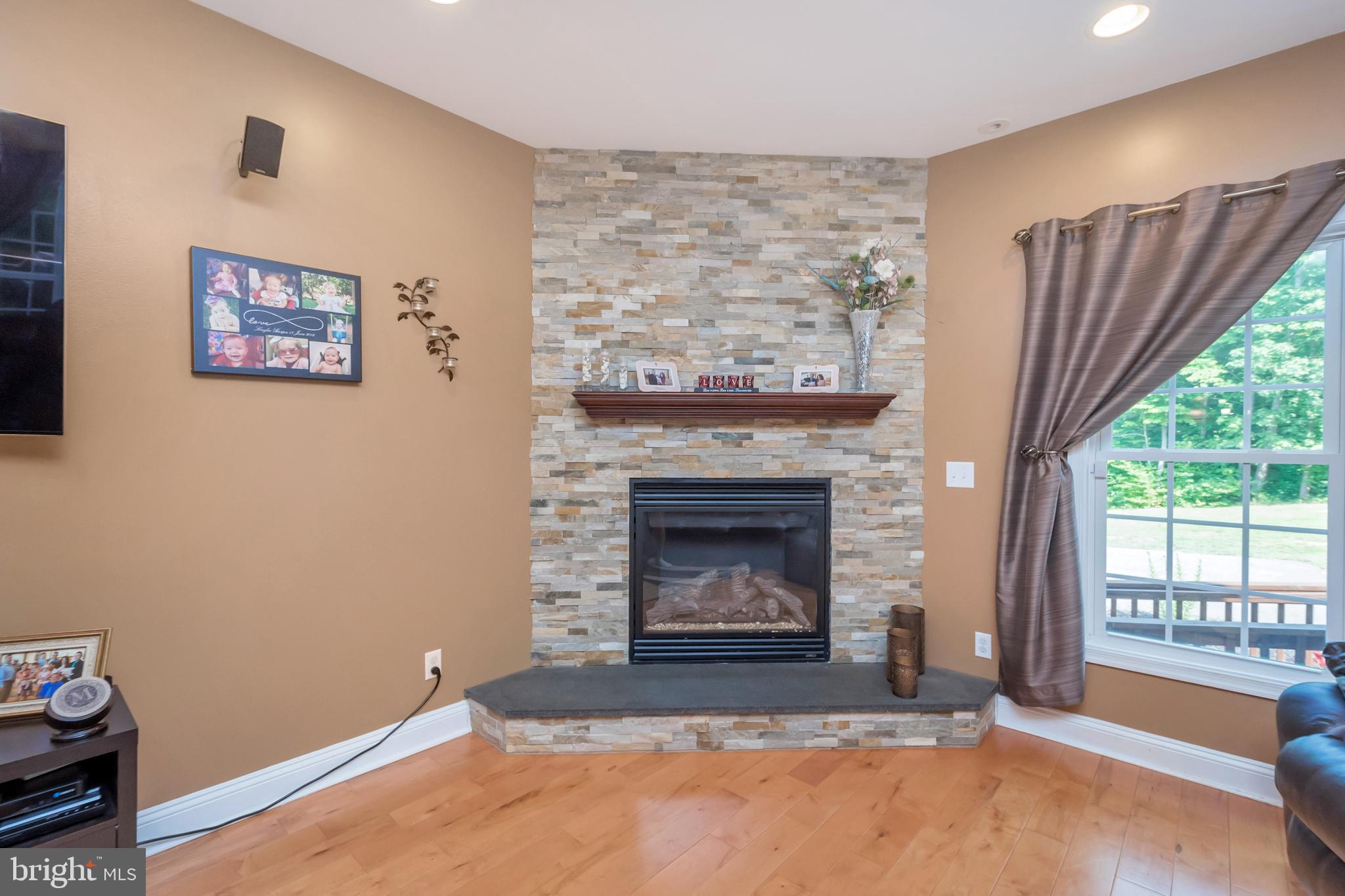 45 Crowncrest Road Fredericksburg, VA 22406 - Photo 16 of 17 a living room with furniture and a fireplace
