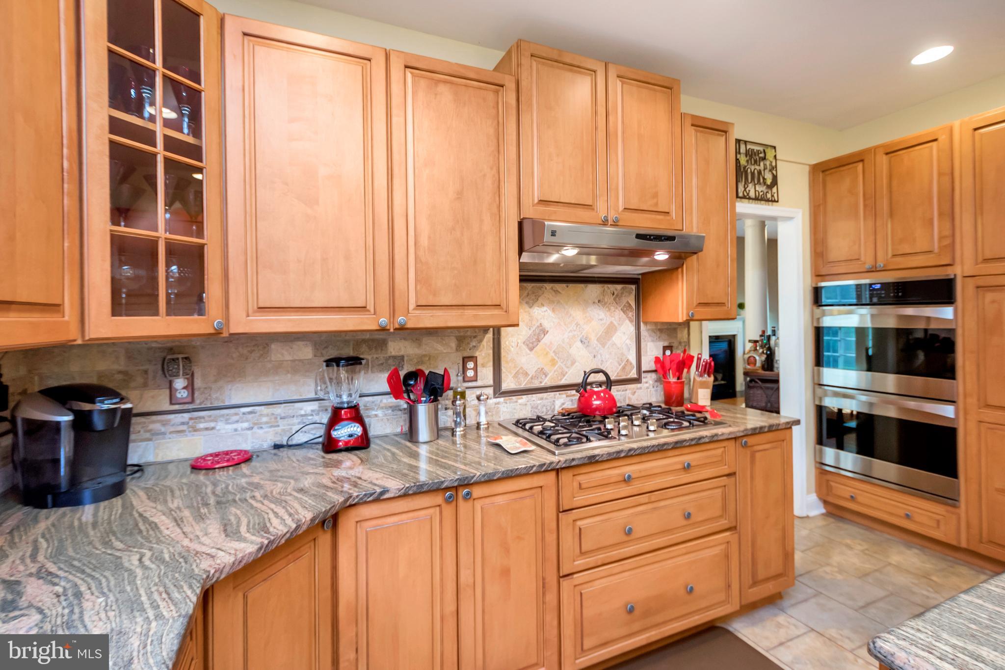 45 Crowncrest Road Fredericksburg, VA 22406 - Photo 8 of 17 a kitchen with stainless steel appliances granite countertop a sink window and cabinets