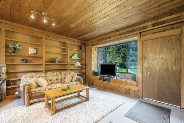 a bed room with a bed and a table