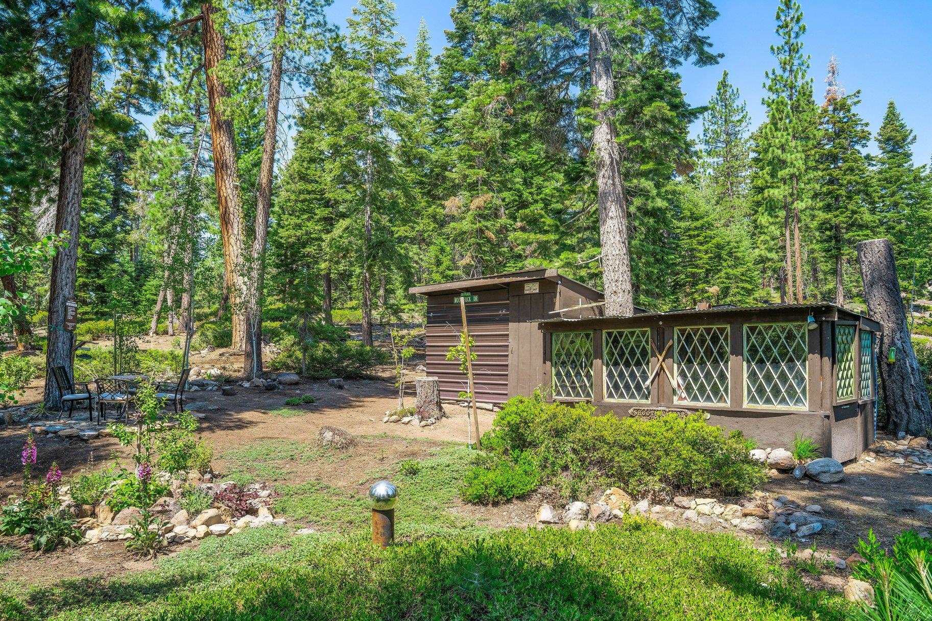 3600 Dinah Road Carnelian Bay, CA 96140 - Photo 22 of 26 a backyard of a house with green garden